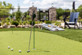 a set of golf clubs on a golf course